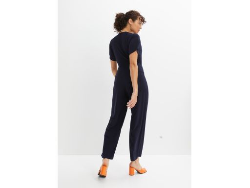 B.P.C granatowy kombinezon z klamrą 52/54.