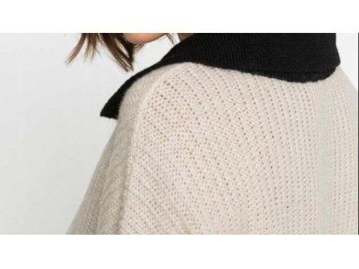 B.P.C sweter beżowy z czarnym kołnierzykiem 40/42.