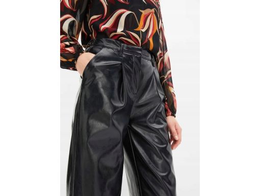 B.P.C spodnie czarne, luźne eko skóra z połyskiem 38.